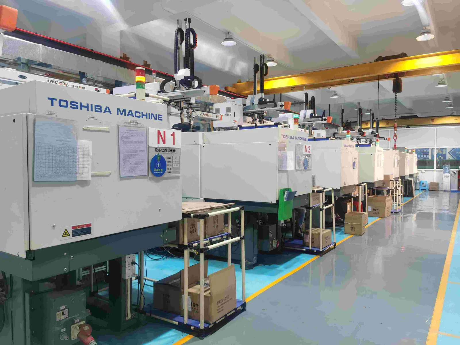 Injection molding machines on the production floor
