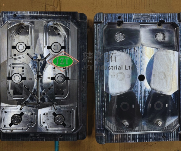Injection mold halves for a large plastic housing