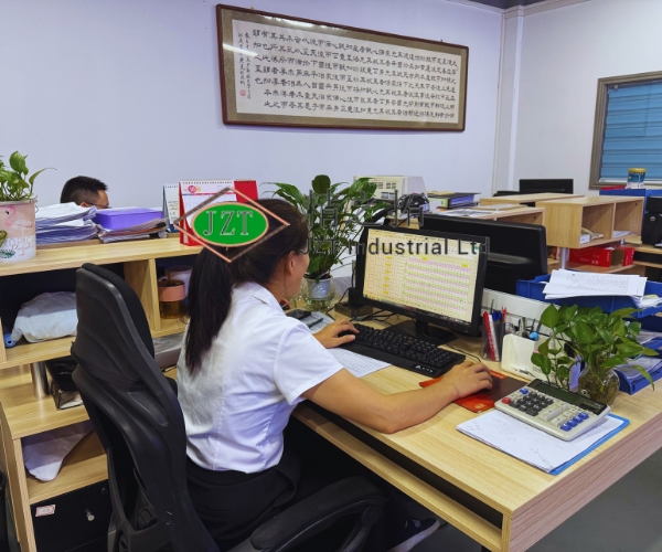 Mold design engineer working at a CAD workstation